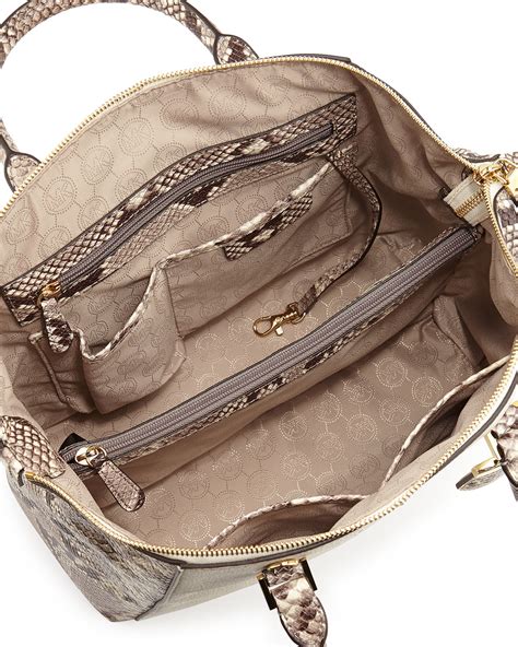 saccoche michael kors|Michael Kors opened satchel purse.